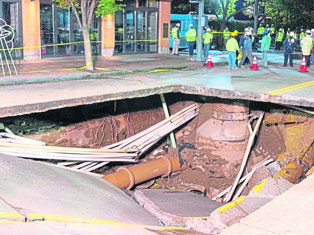 Big Bus Swallowed By Bigger Sinkhole In Pittsburgh