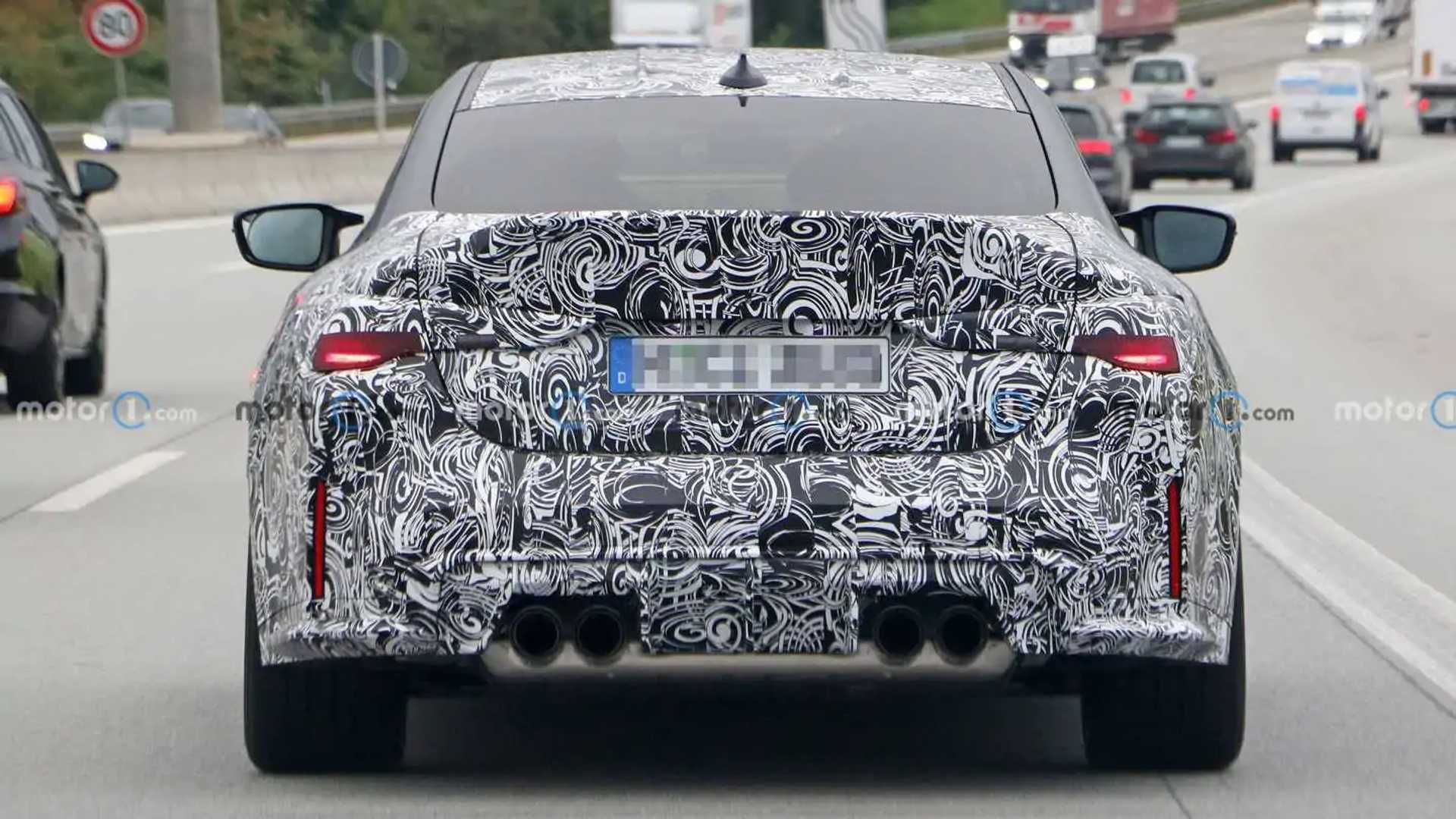 2023 BMW M4 CSL Spotted in Traffic with New Taillights and Bigger Spoiler