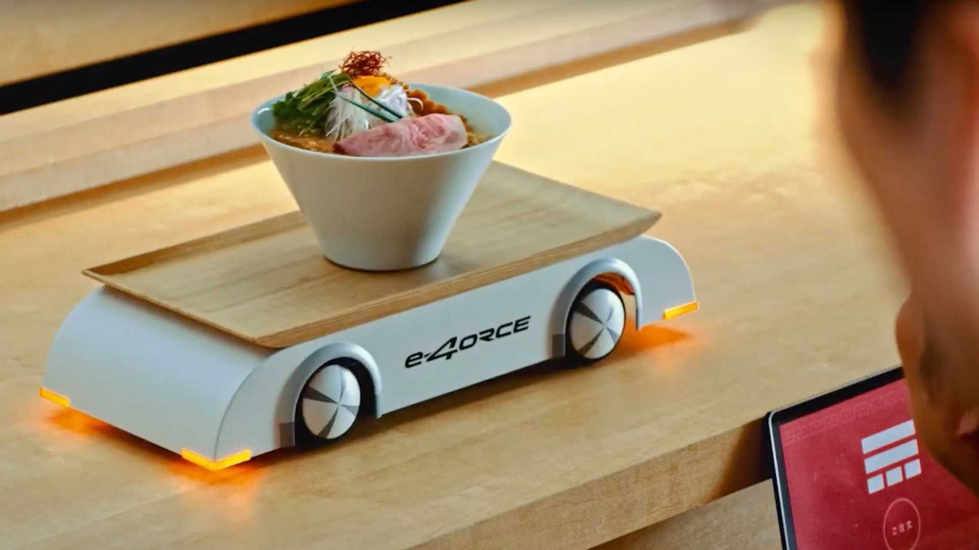 Nissan Demonstrates Ariya E-4ORCE’s Smoothness with A Ramen Robot