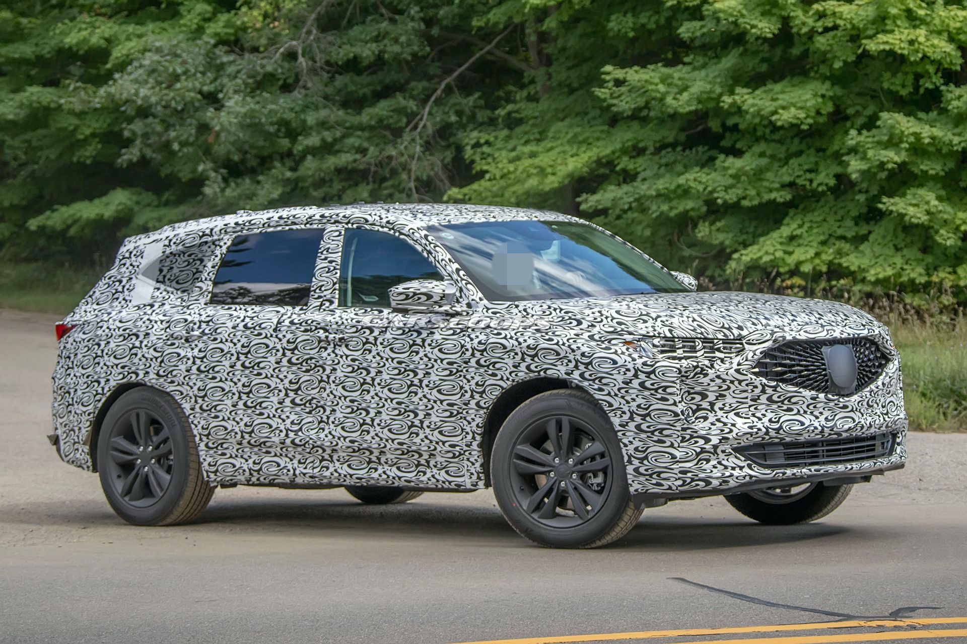 Is this the Acura MDX under camouflage?