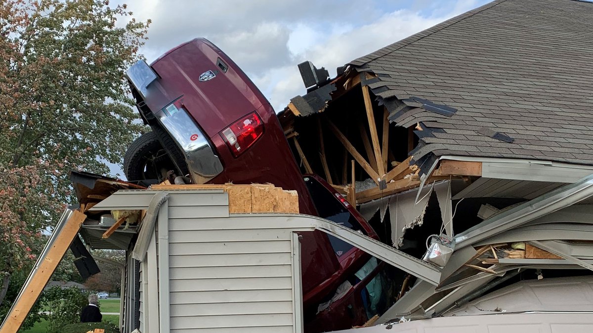 Truck jumps ditch, crashes through roof of Wisconsin home