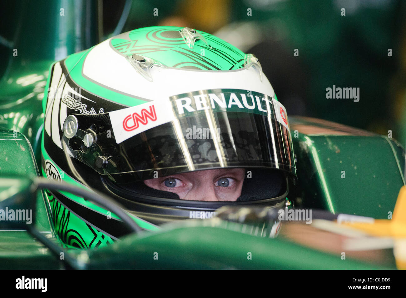 Kovalainen to wear green helmet in 2010