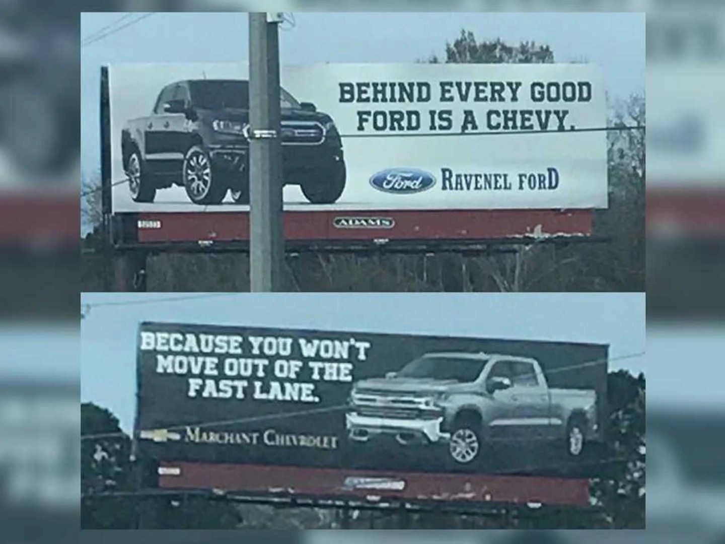 Ford and Chevy Dealers Compete in Billboard Battle