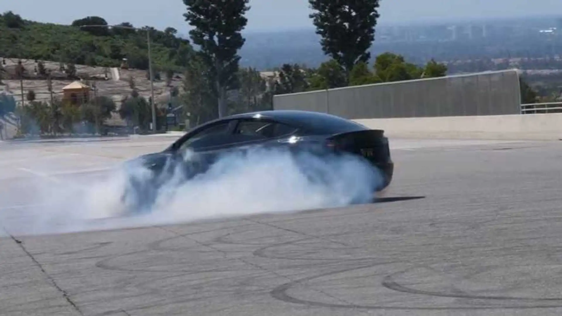 Watch Tesla Model 3 Make Doughnuts & Drift