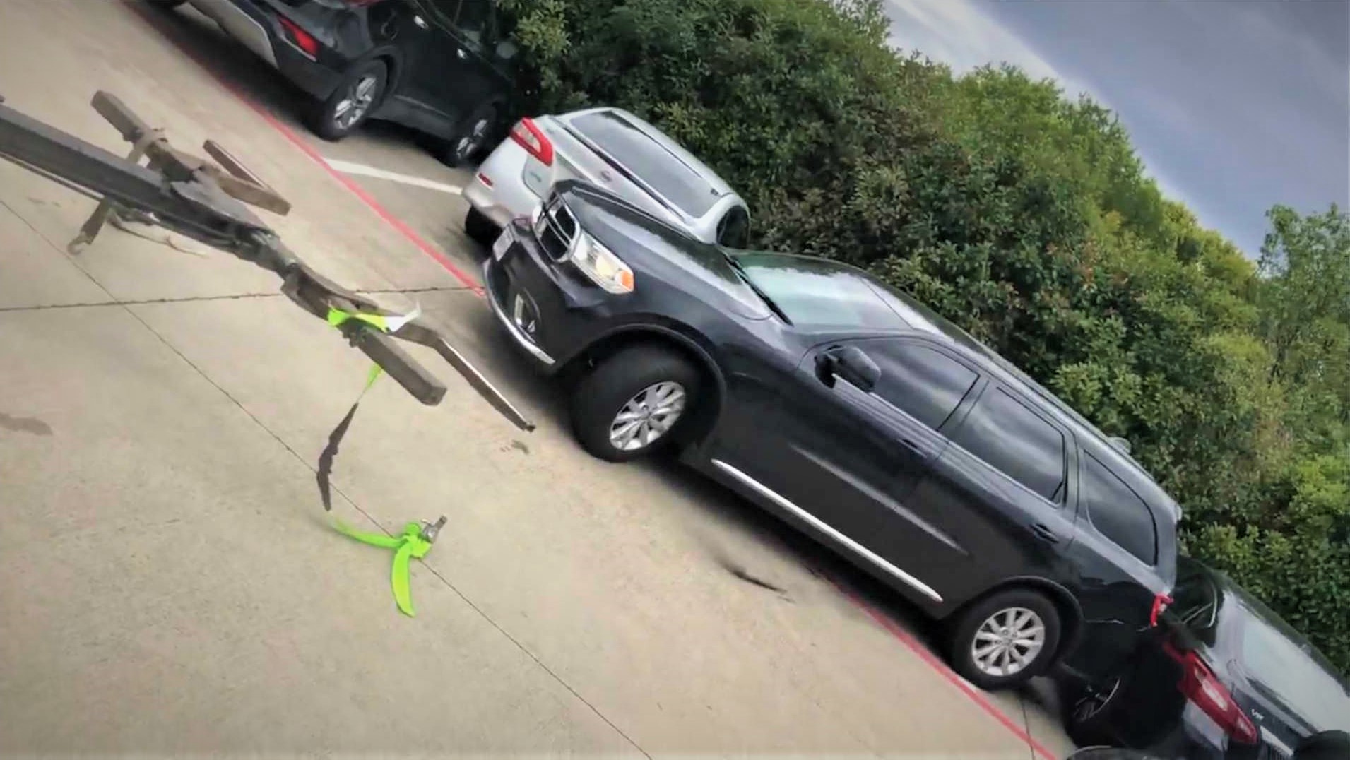 Woman stops her Dodge from being Repo'd, but leaves behind a trail of destruction