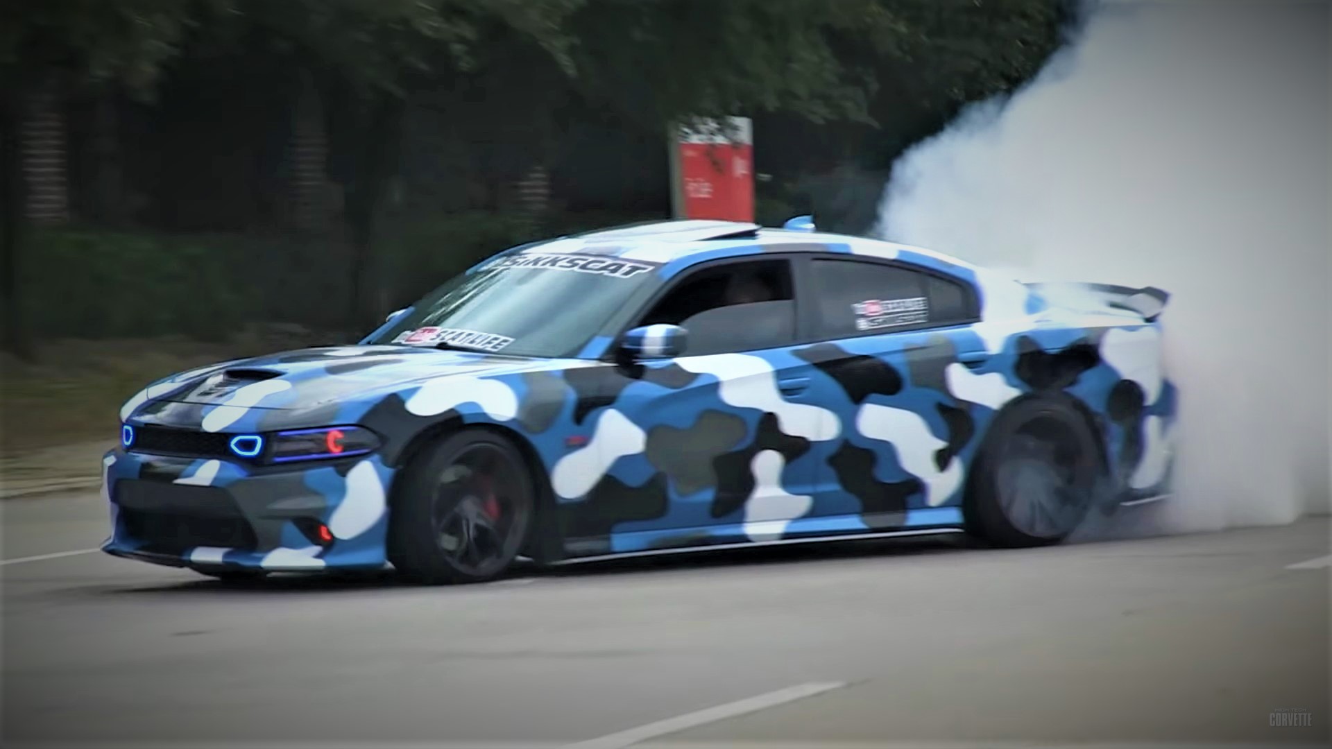 After a failure to burnout, dumb Dodge Charger driver hits the crowd. Flees Scene