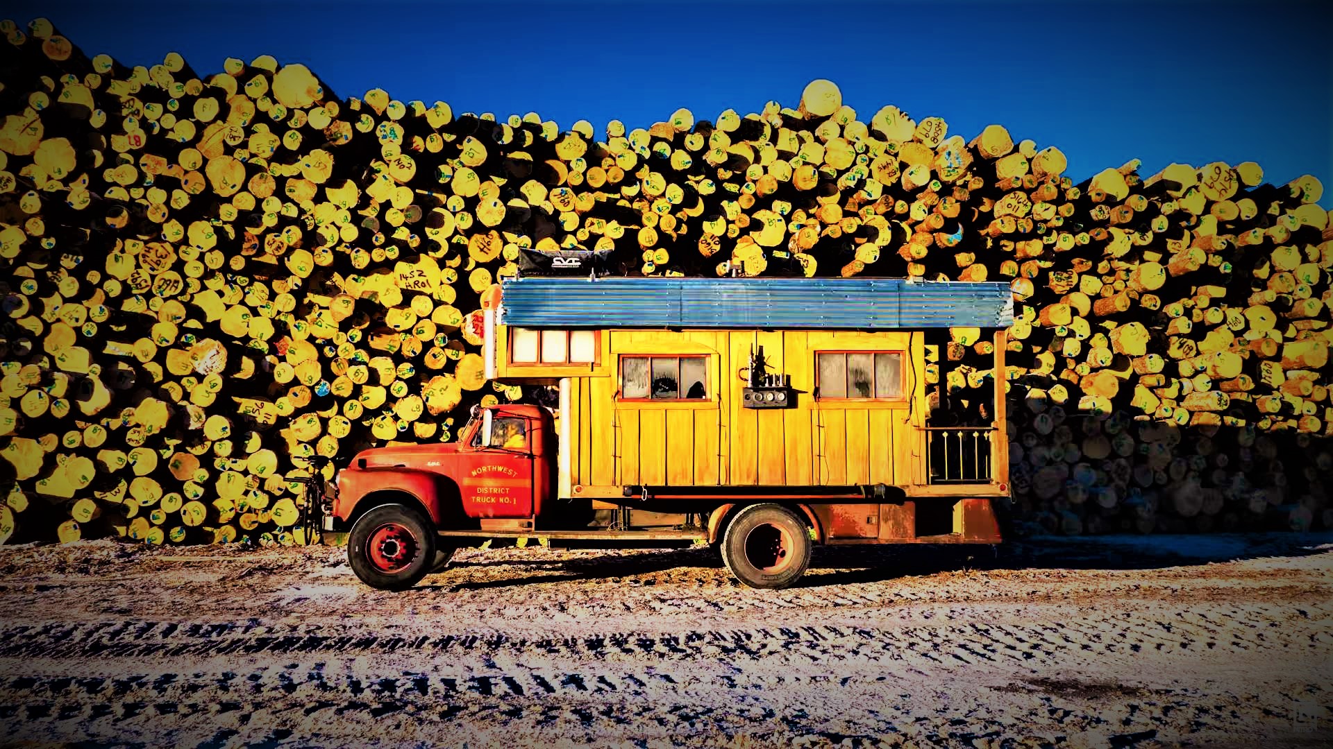 This 1953 GMC Firetruck lives a snowboarding life as a rustic camper.