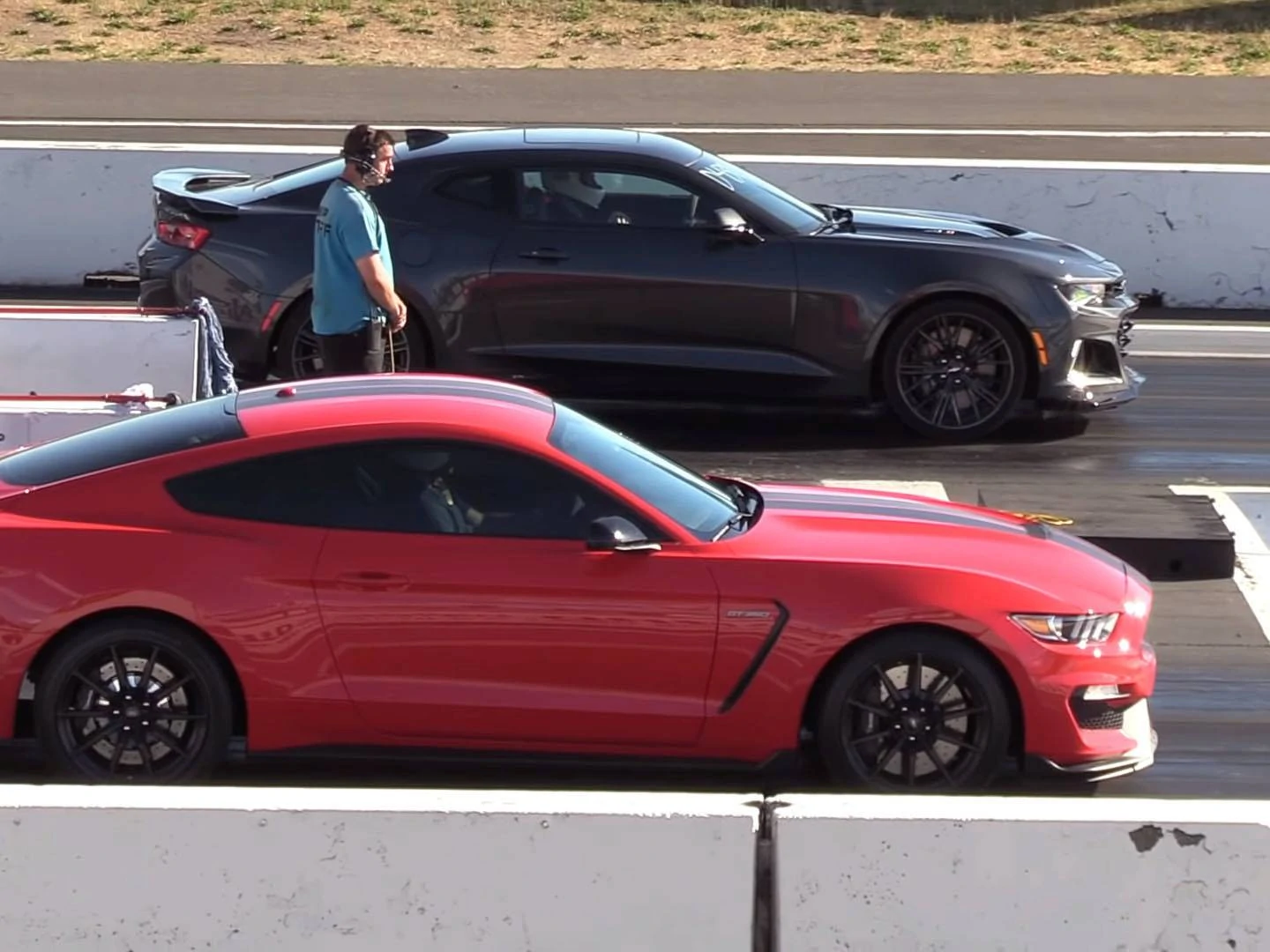 Stock Camaro ZL1 and Mustang Shelby GT350 Battle At The Strip