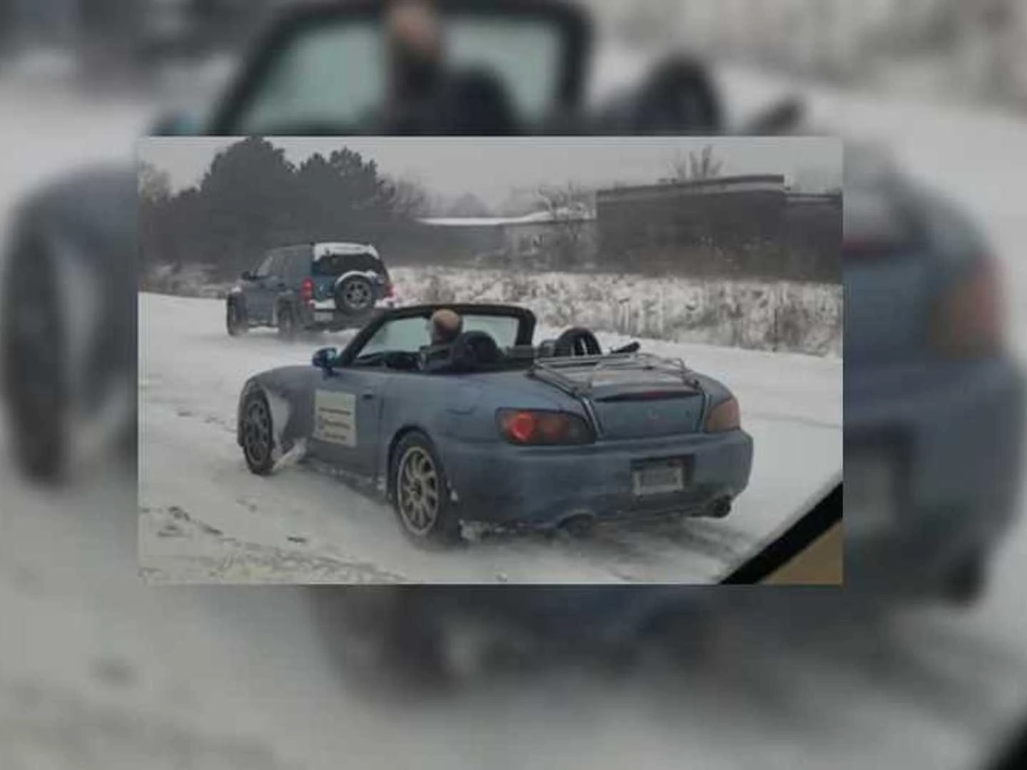 Honda S2000 owner drives his Honda S2000 roofless in snow for a good cause