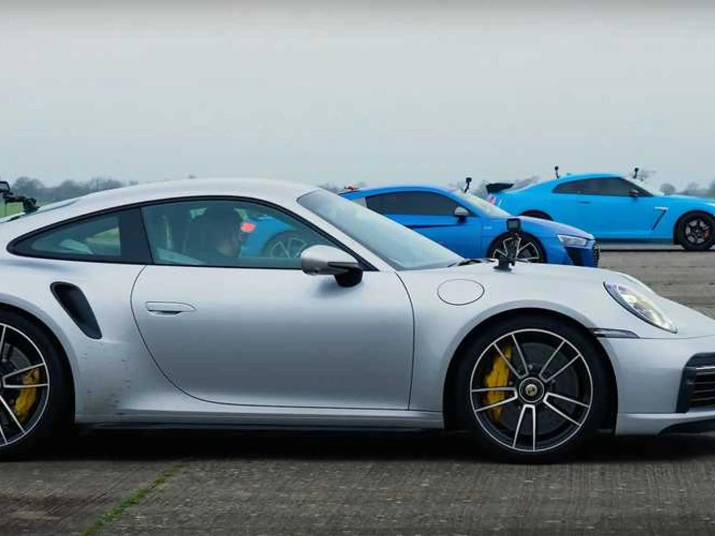 Watch Porsche 911 Turbo S Crush Both GT-R Nismo, Audi R8 In A Drag Race