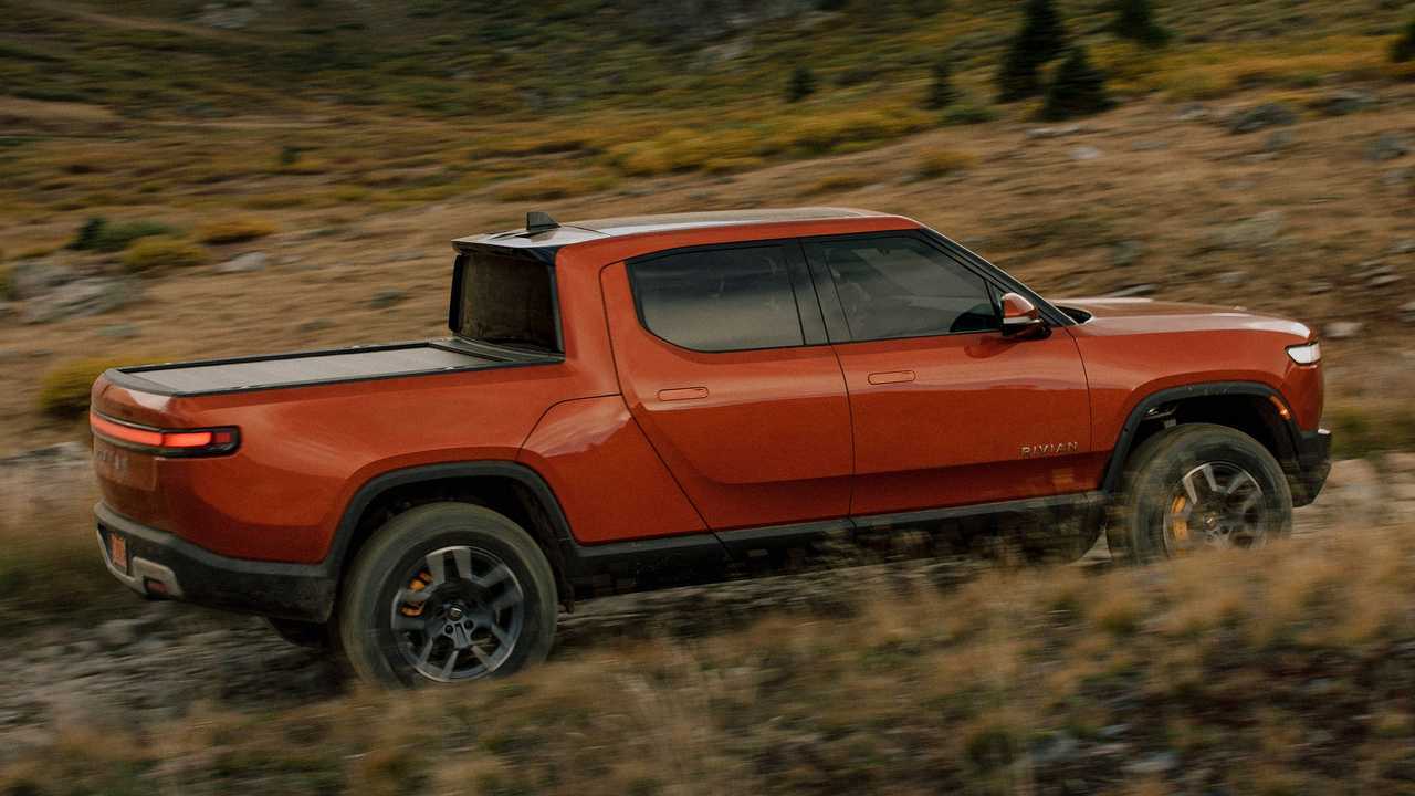 Rivian R1T Renovated As High-Riding, 6-Wheeled Off Road-Ready Rig