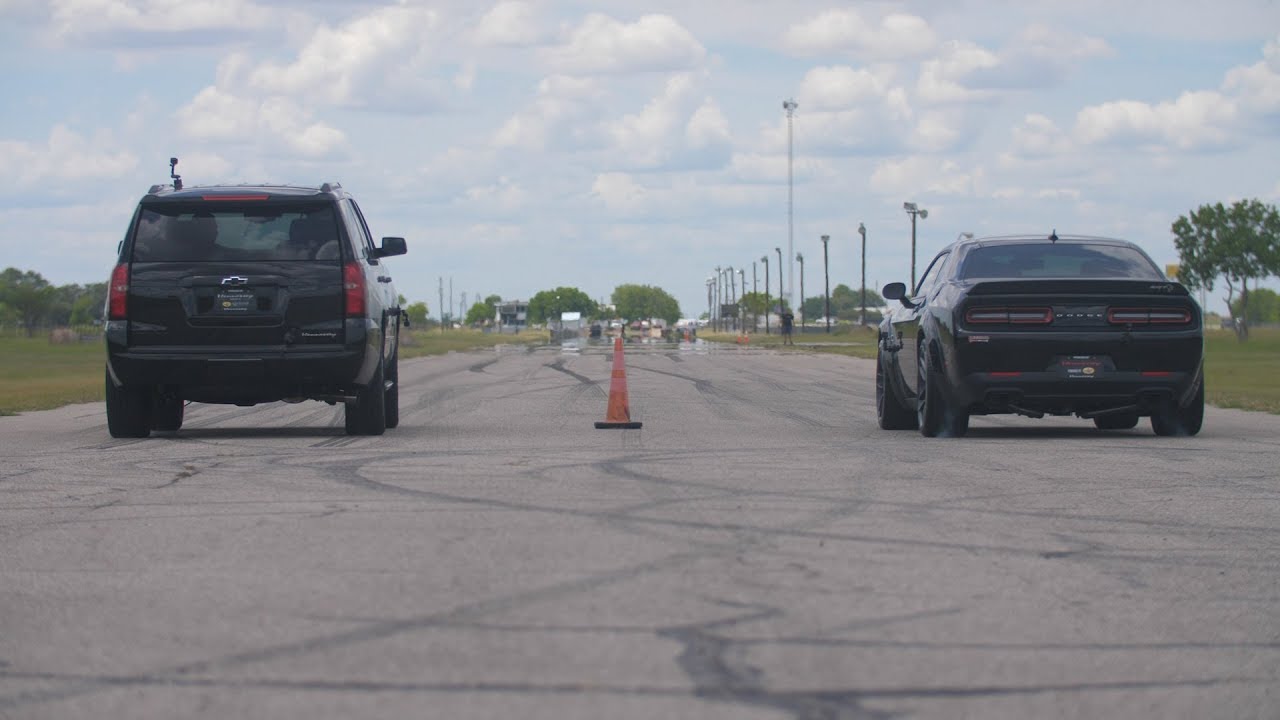 See 805-HP Tahoe RST Drag Race 707-HP Hellcat Challenger Widebody