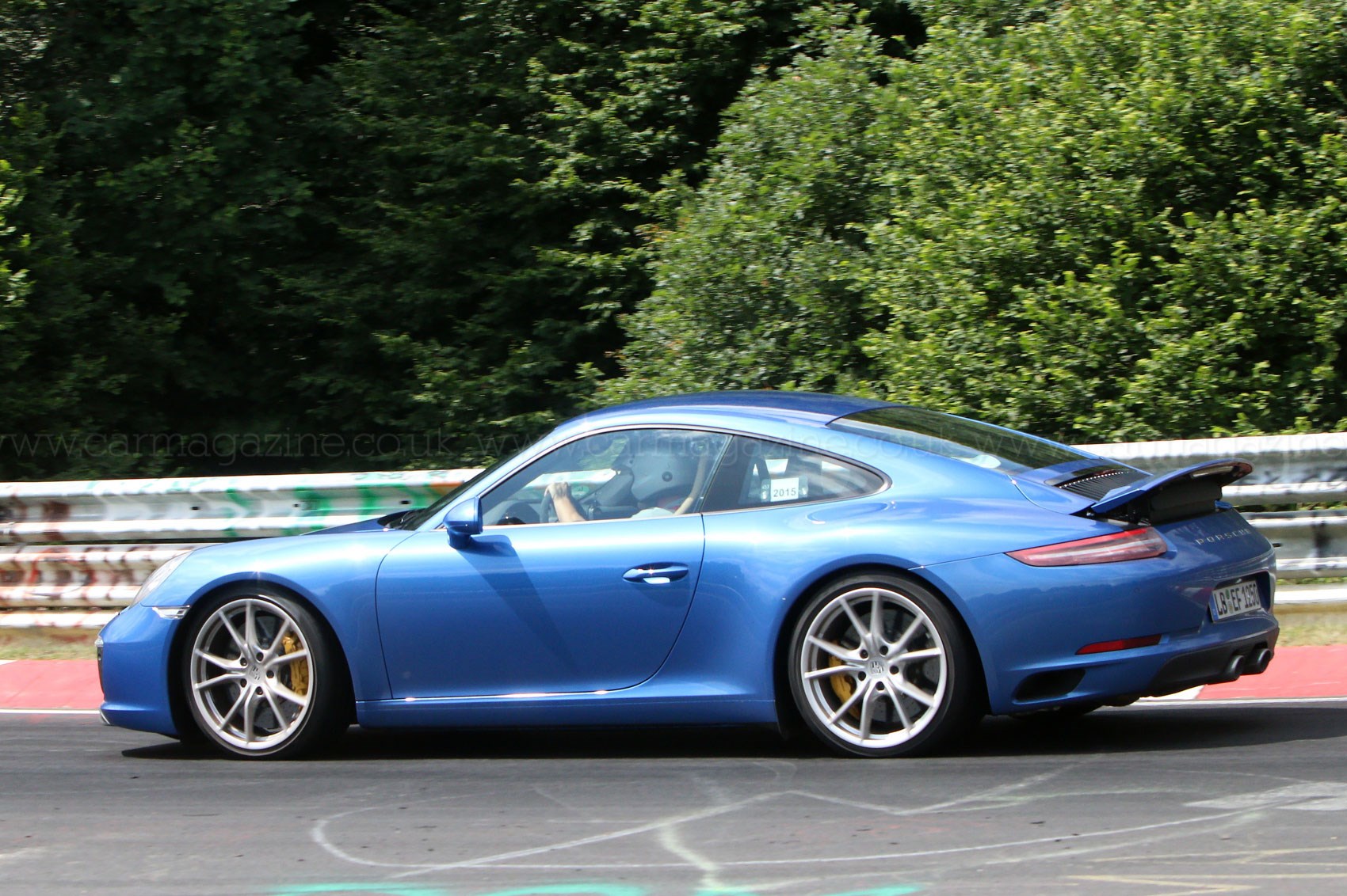 Porsche 911 facelift captured without camo (26 photos)