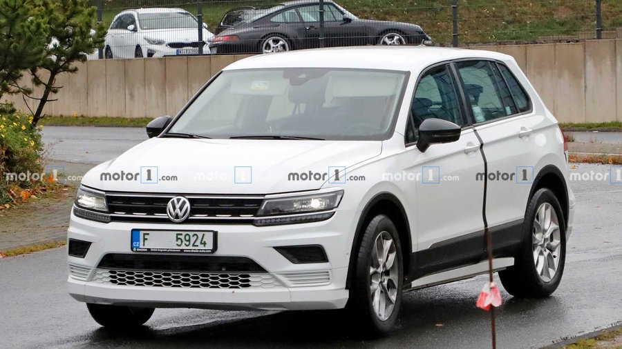 Skoda Electric Vehicle Mule Tested Underneath Volkswagen Tiguan Skin