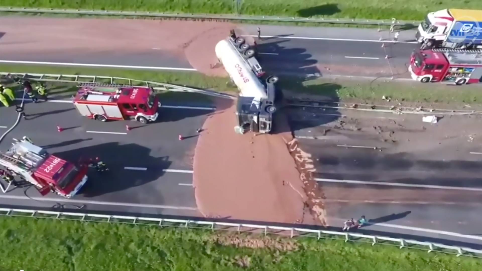 Overturned truck spills yummy chocolate all over highway