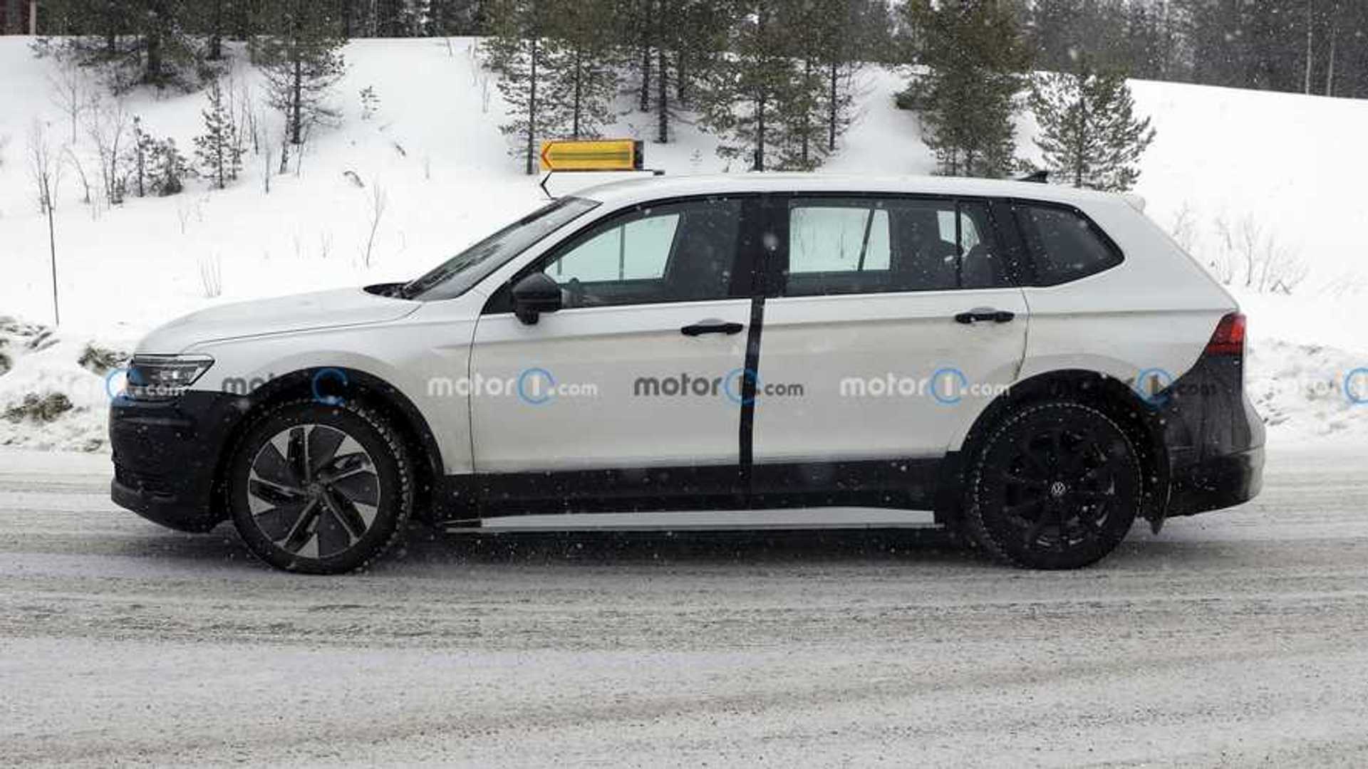 Skoda Electric Vehicle Mule Tested Underneath Volkswagen Tiguan Skin