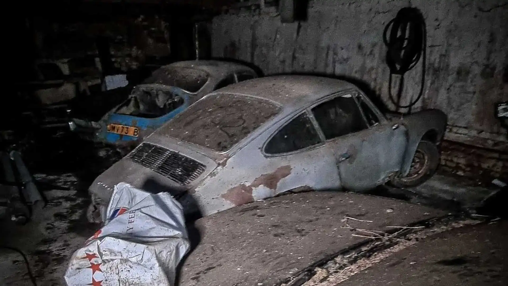 Classic Porsches, Jaguars, And Bentleys Filmed In Huge Barn Find