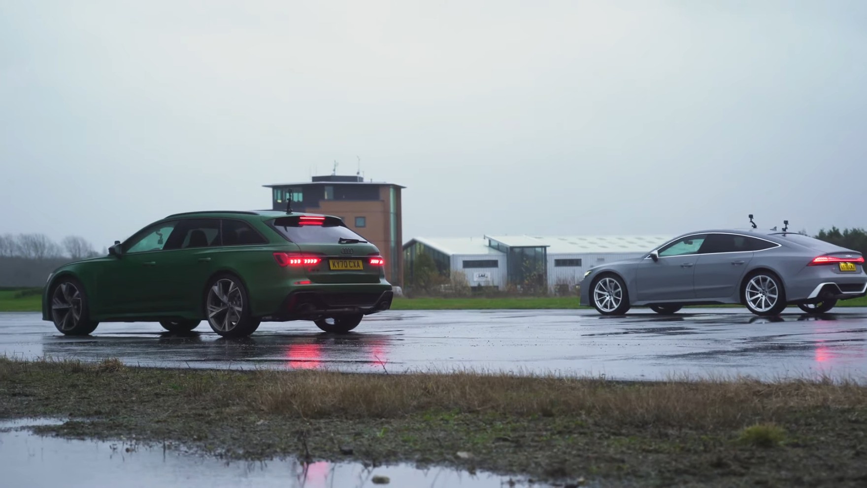 Audi RS6 Avant Vs RS7 Sportback Drag Racing Ends in Photo Finish