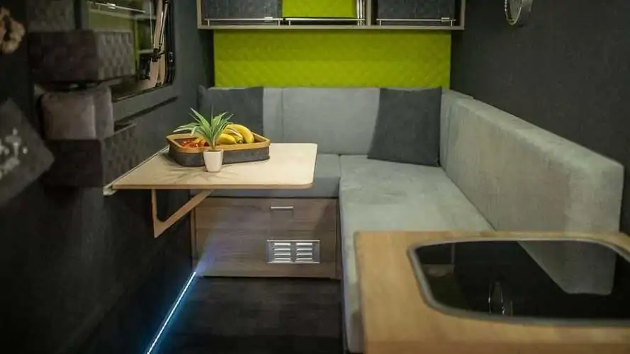 German company converts compact utility trailer to cozy camper for two