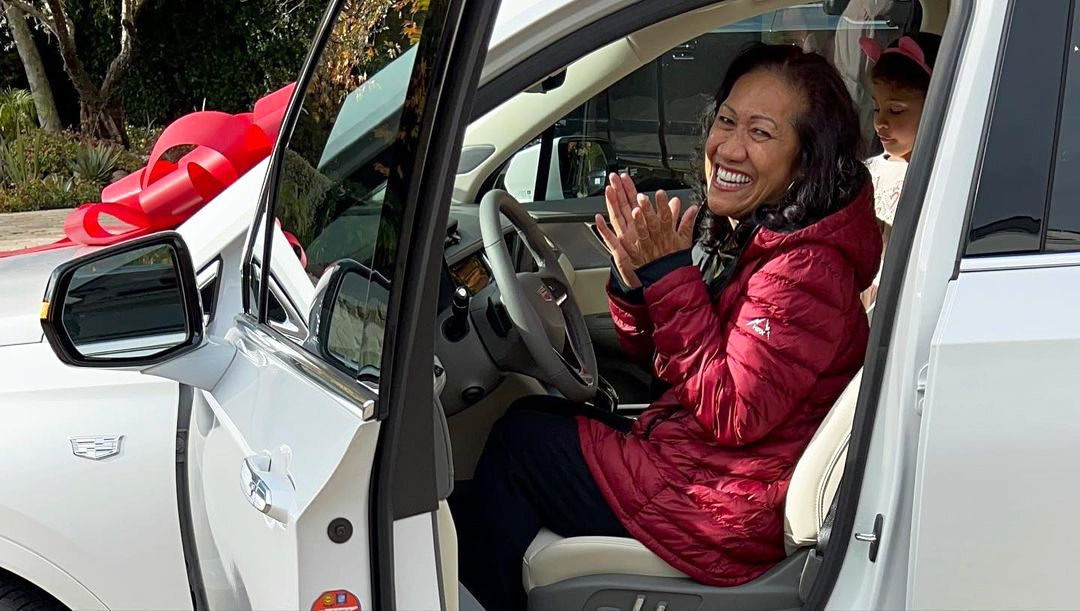 Watch the Rock surprise his mom with a new Cadillac for Christmas