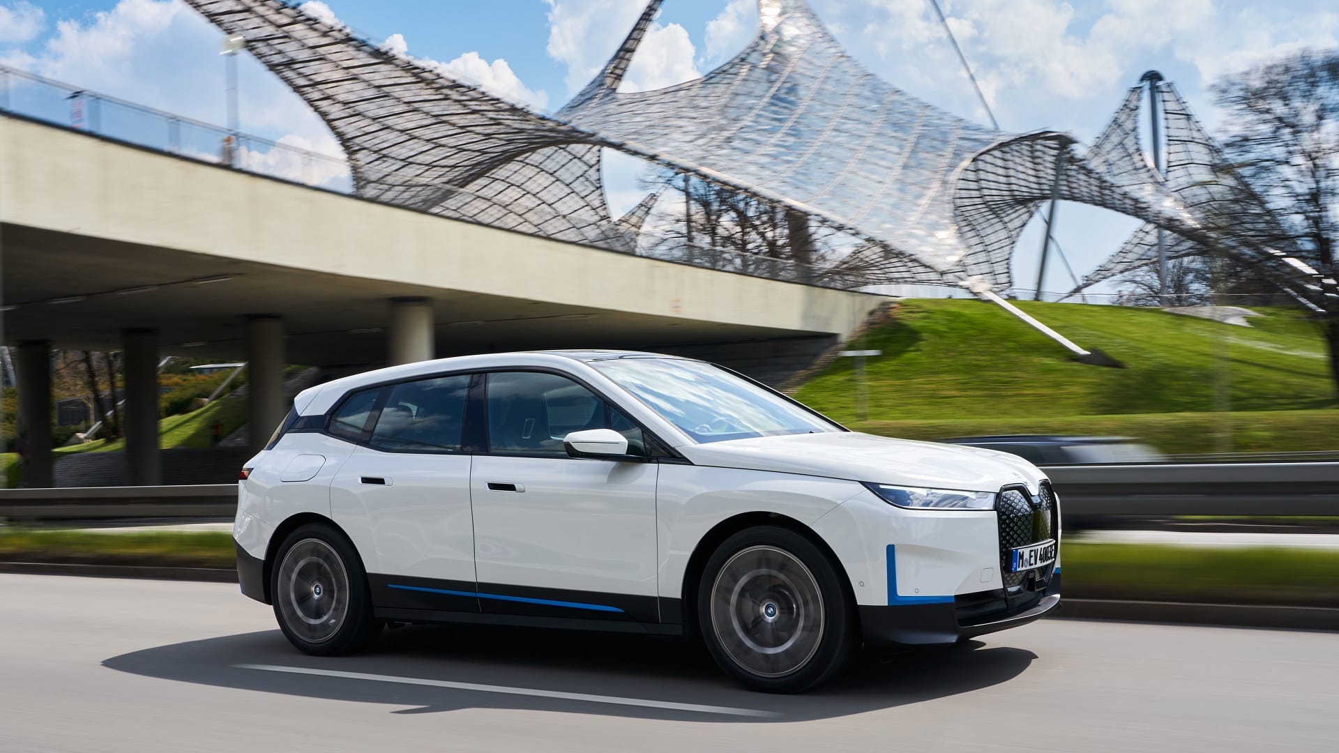 BMW iX Driving Itself Around Looking for A Charge and Wash