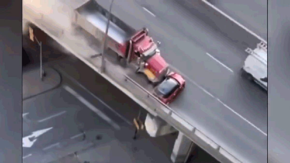 Truck driver pushes Mini Cooper for half a mile before stopping