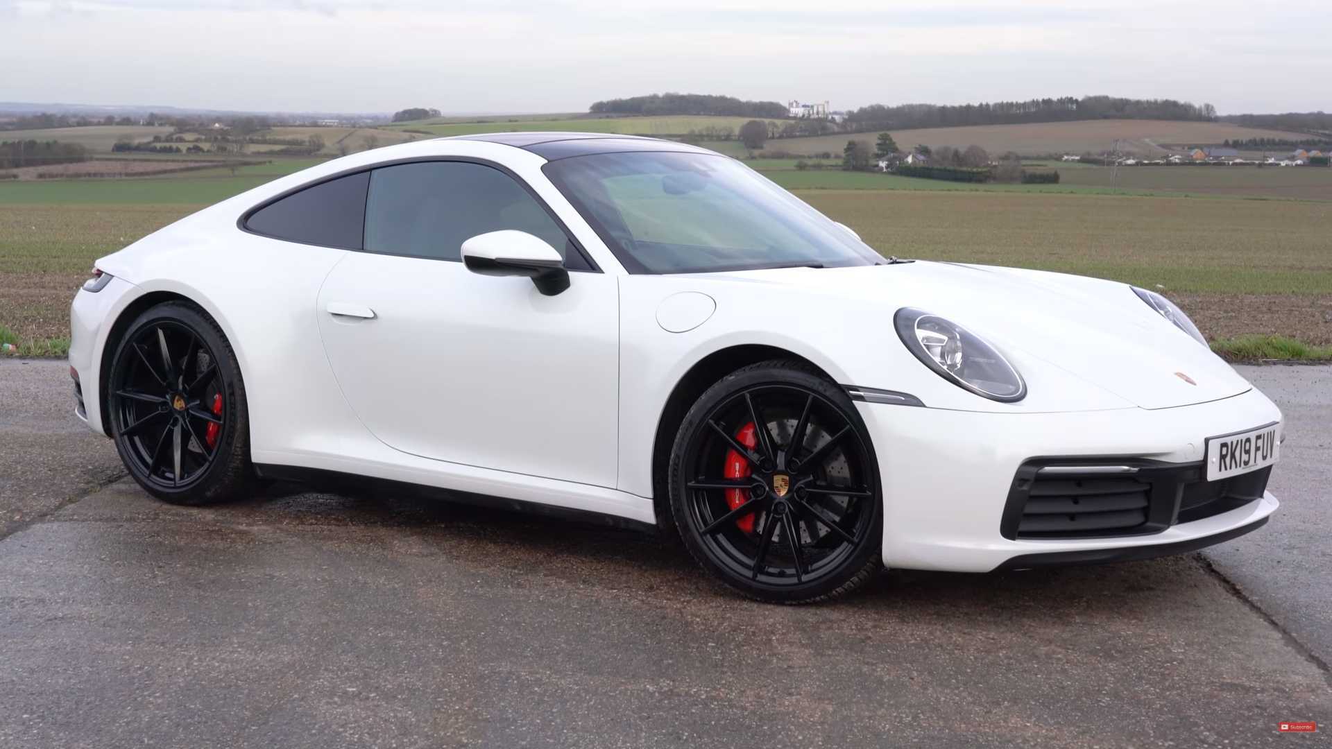 Can A Porsche 911 On Snow Tires Carve Corners At A Race Track?