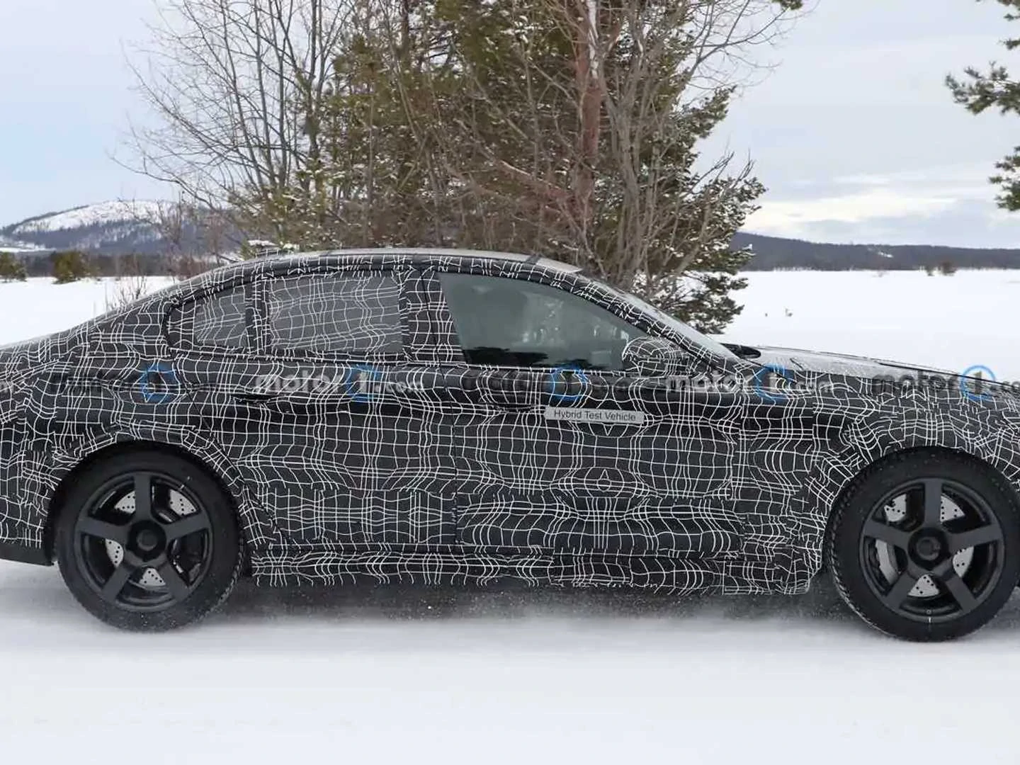 2024 BMW M5 Spied with Giant Brakes and "Hybrid Stickers"