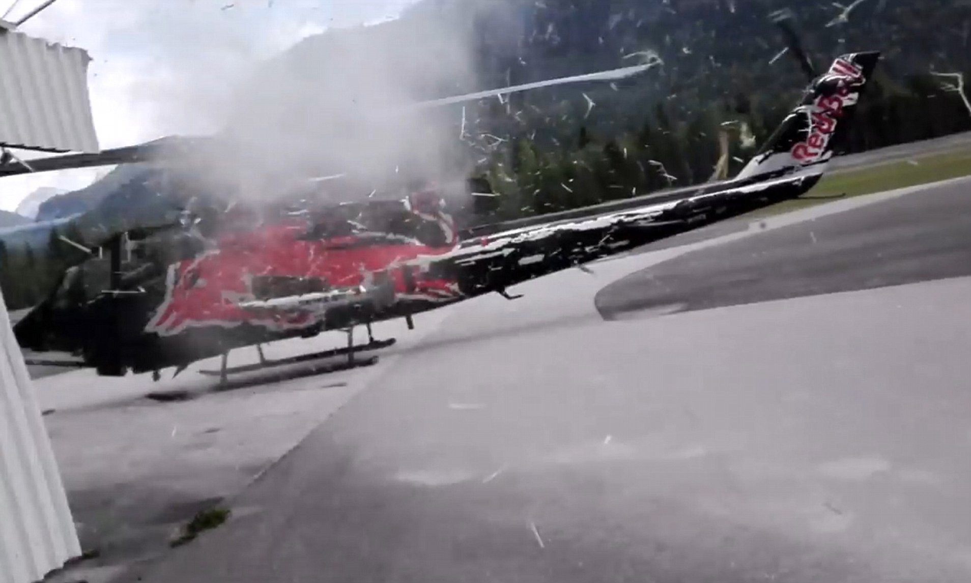 Red Bull Cobra Helicopter Slashes an Airport Building with Blades