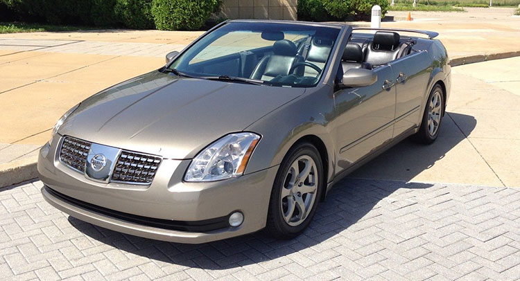 eBay fails to sell a unique Nissan Maxima convertible equipped with suicide doors