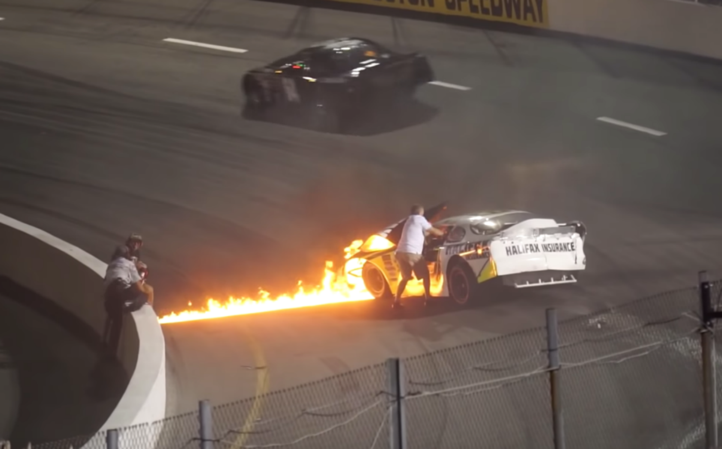 Watch A Father Save His Child From A Car of Burning Race