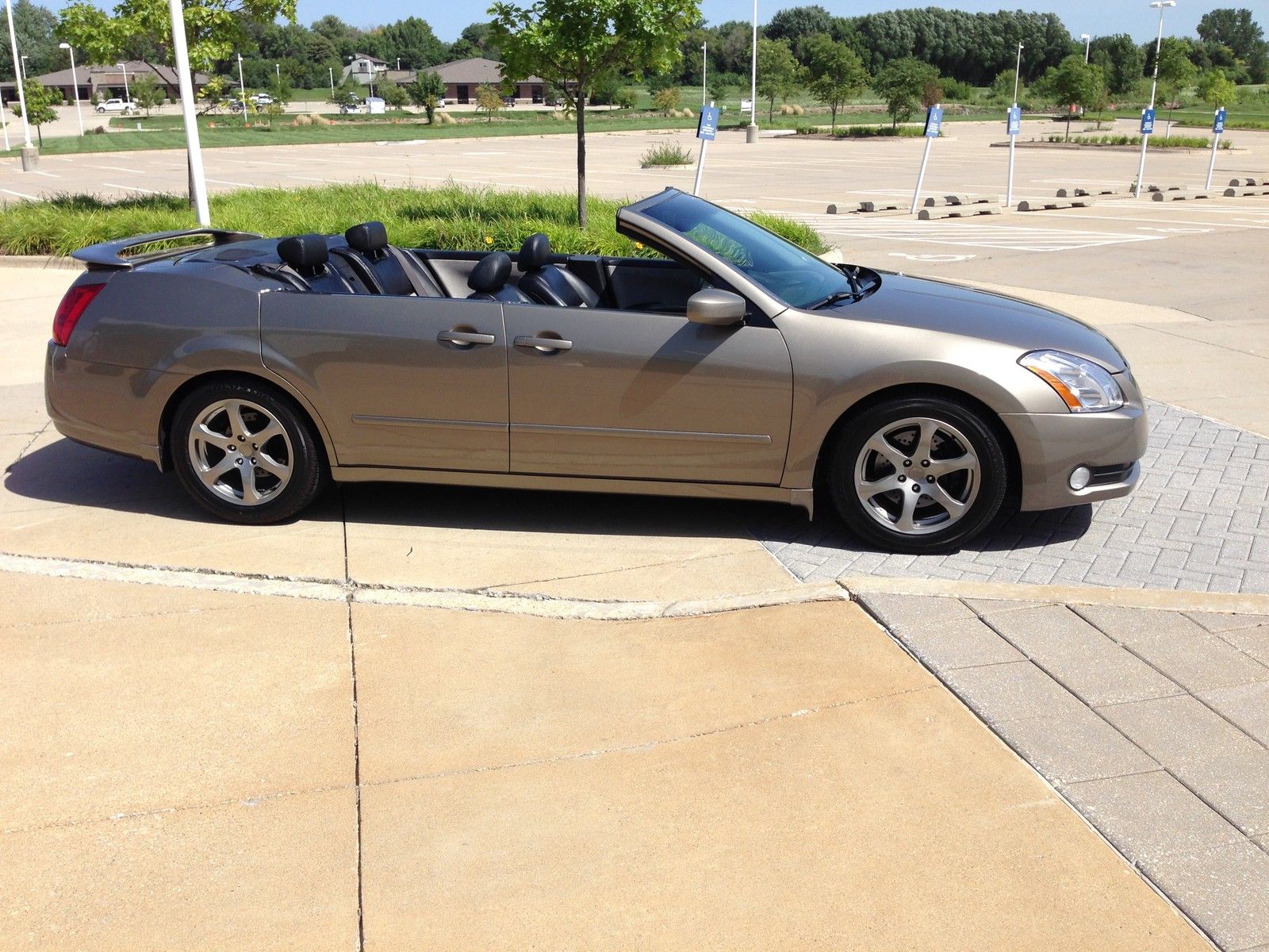 eBay fails to sell a unique Nissan Maxima convertible equipped with suicide doors