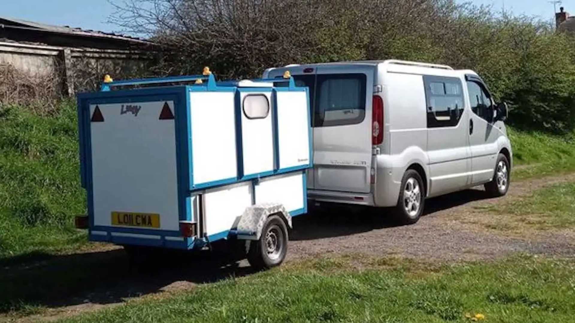 A van lifer could find it a blessing to tow an extended bathroom like this.