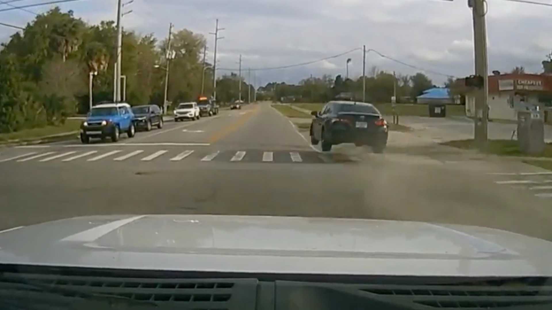 Toyota Camry takes off during a police chase, and then promptly crashes