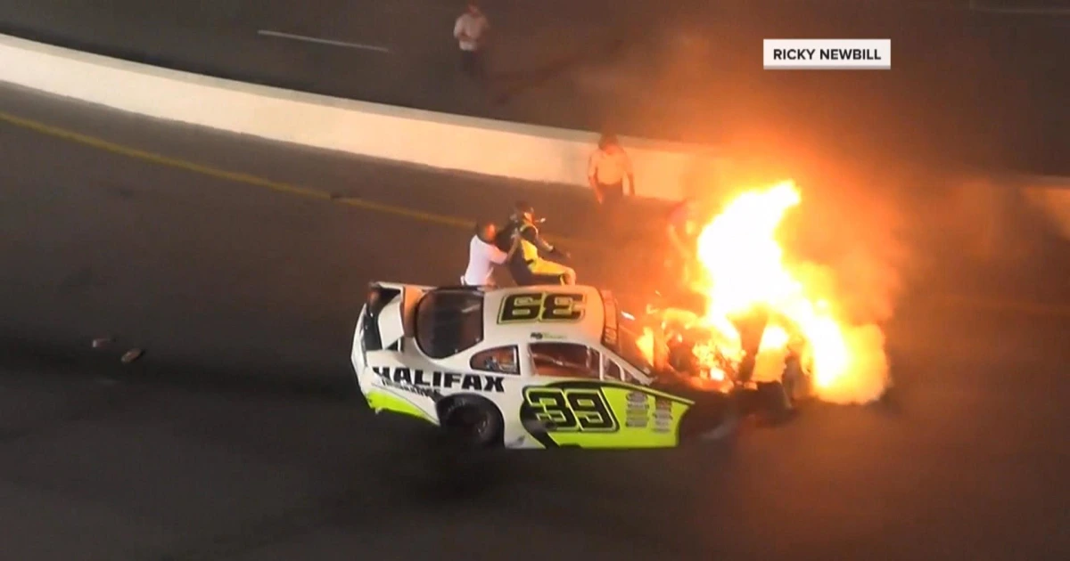 Watch A Father Save His Child From A Car of Burning Race