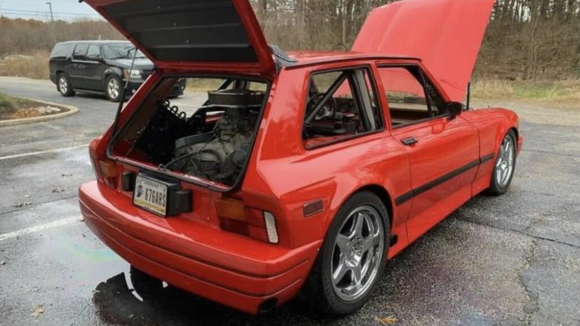 This Humble Yugo Hatchback runs on two Cadillac V8s and is for sale