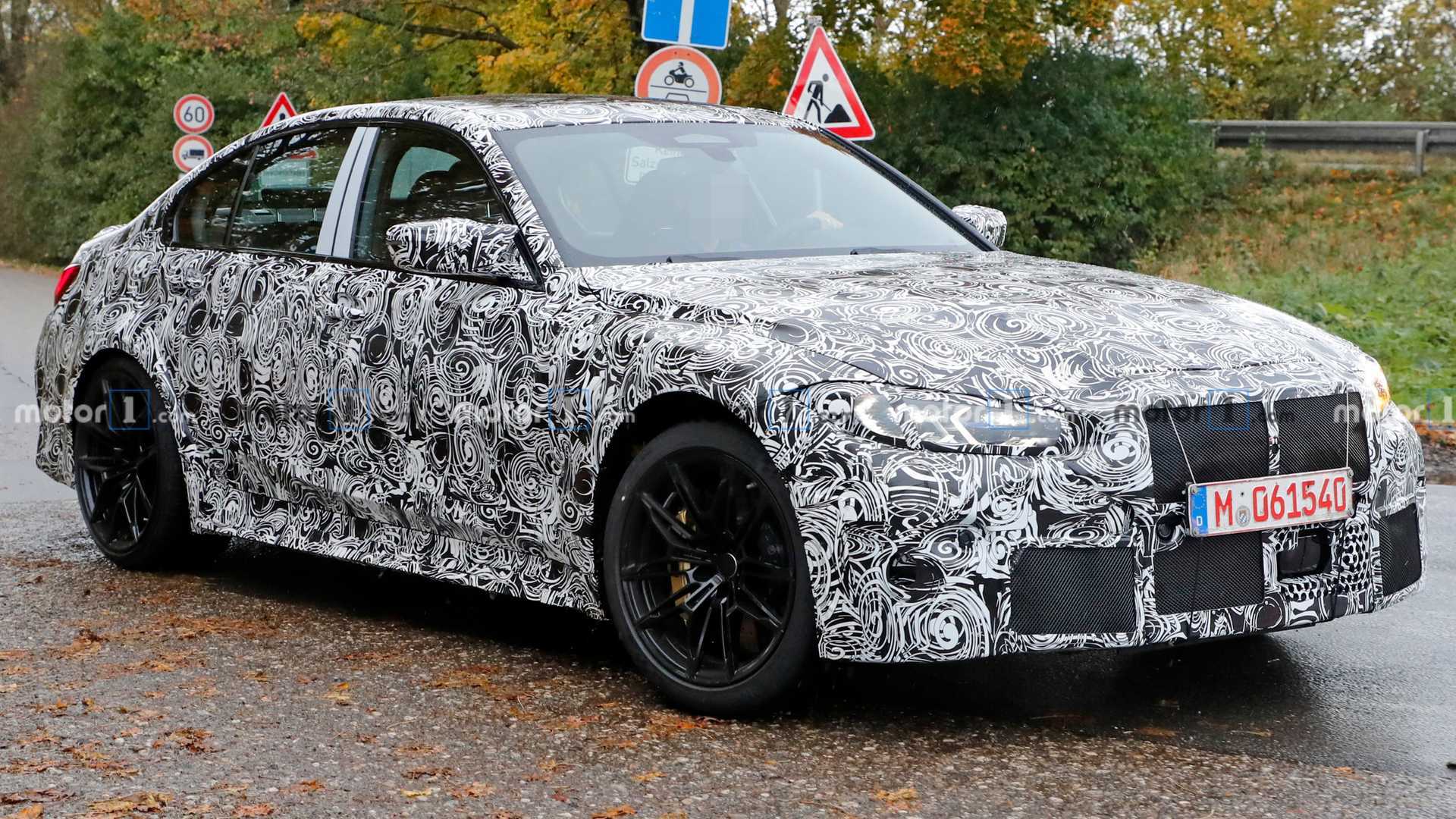 2021 BMW M3 loses some camouflage in new spy shots