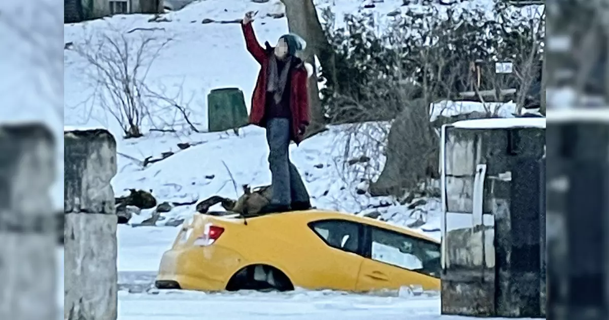 Scion tC Driver Takes a Selfie as Her Car Sinks into Frozen River