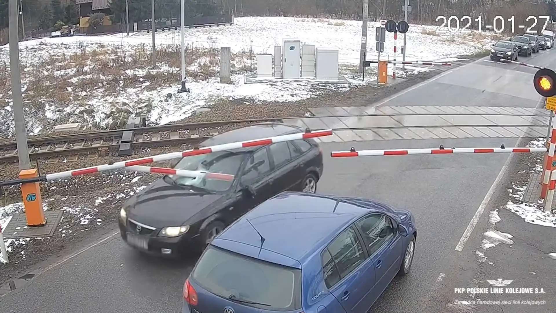 Mazda Driver Nearly Killed by Railroad Crossing Gate during Chase