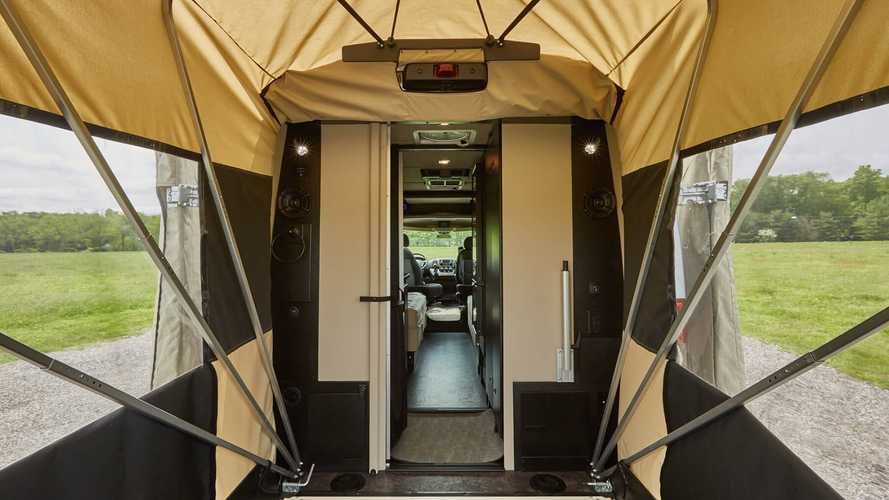 The Embassy Traveler Sport Camper van expands in size with a rear-mounted porch