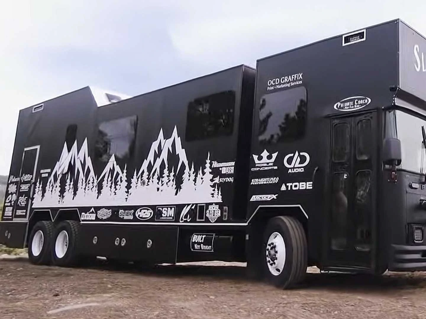 This Incredible Monster Motorhome for Snowmobilers Was Once A School Bus