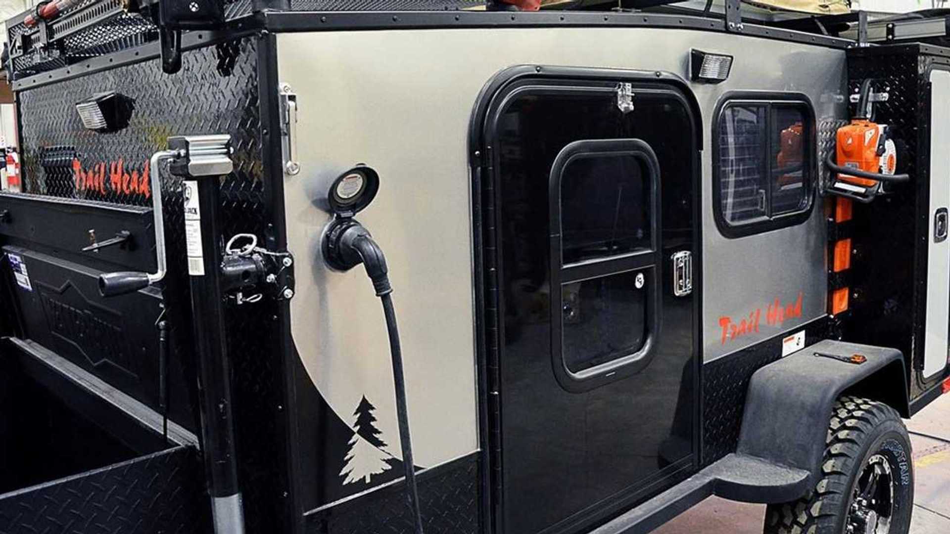 This Camper Towable Comes Standard with A Chainsaw