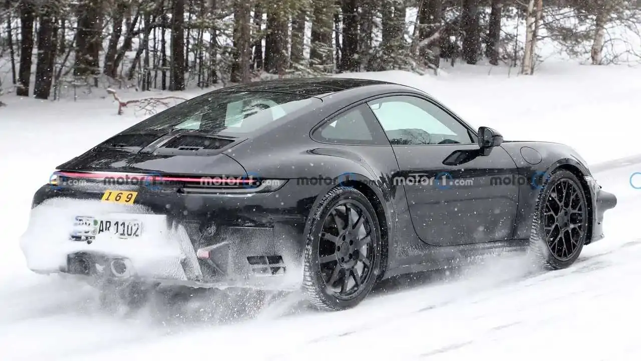 Porsche 911 Hybrid Spied In 21 Pictures Of Snowy Development