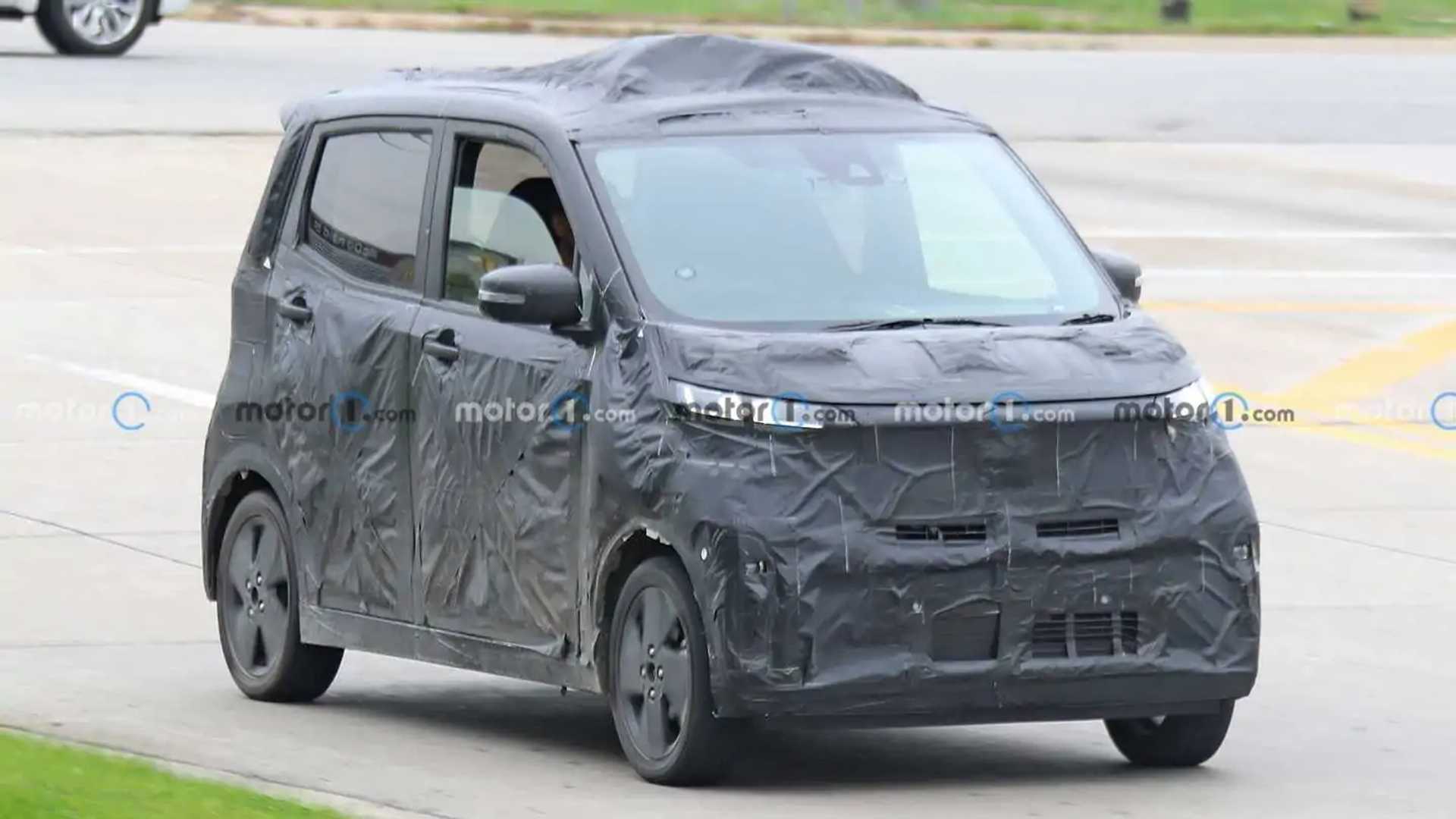 Nissan IMk Tiny Electric Car Tested As Camouflaged Prototype