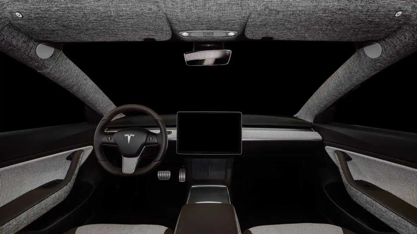 The Tesla Model 3 by Vilner Looks Elegant With Tartan Gray Fabric Inside