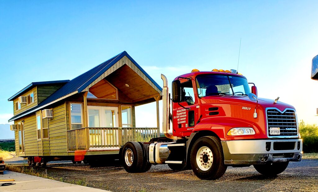 Minimalist House-Towing Semi Also Includes Space for A Second Car