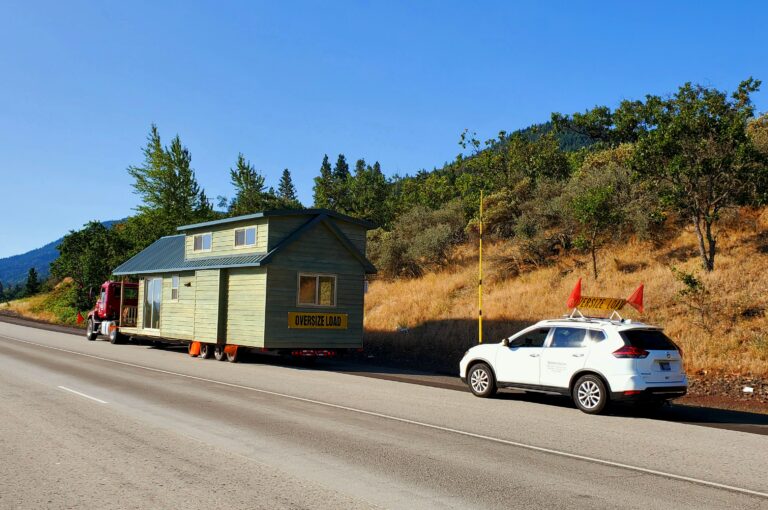 Minimalist House-Towing Semi Also Includes Space for A Second Car