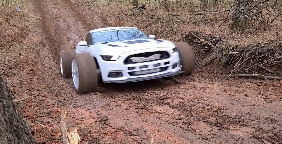 Watch Crazy Ford Mustang MUDstang vs Regular Mustang in Hill Climb Duel