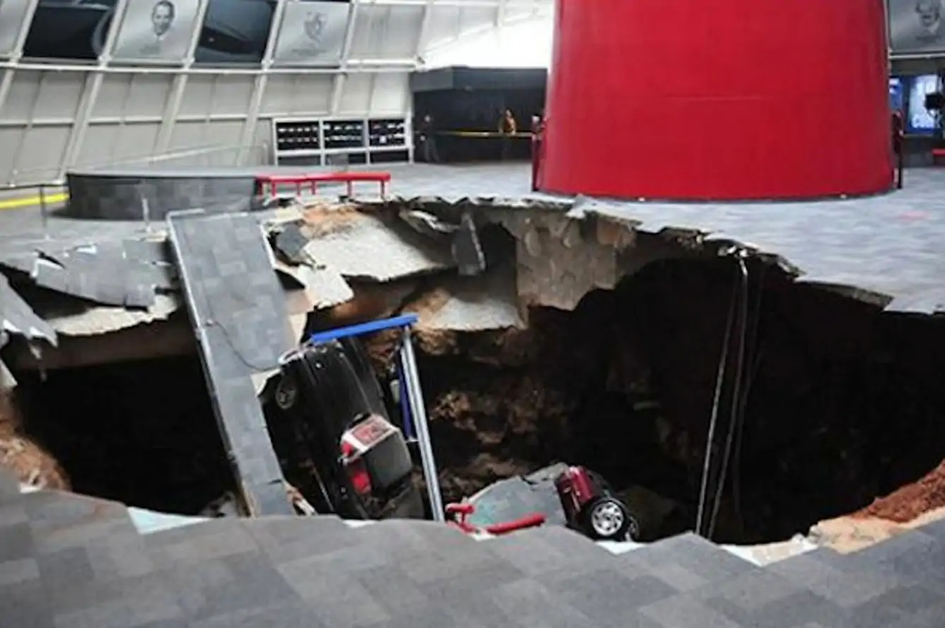 This Must Be the Smallest Sinkhole To Ever Swallow An Entire Car