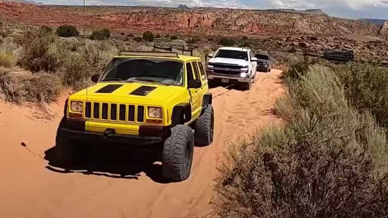 Watch Recovery Crew rescue 7 vehicles stuck in the same patch of sand